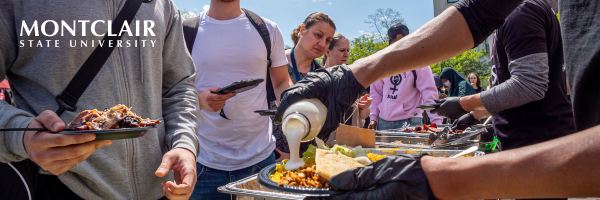 Students getting served food on campus