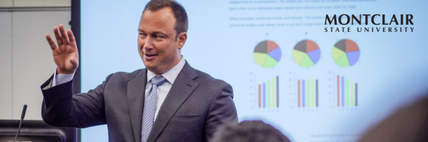 Professor lecuring in front of a class 